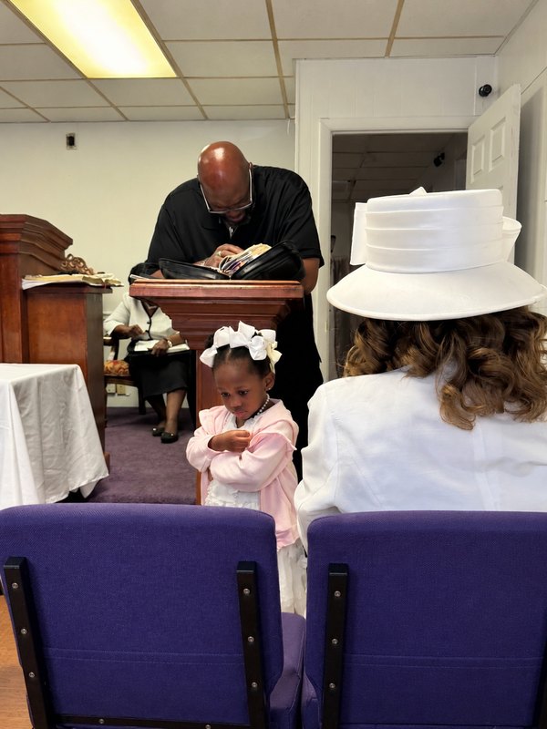 Ms. Ivy Gavin during worship at Faith Cathedral