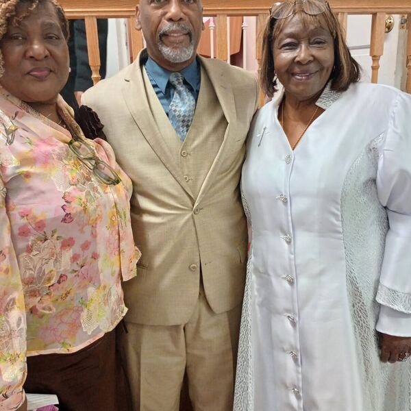 Pastor Carrie Mitchell-Long with church members