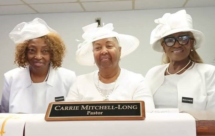 Pastor Carrie Mitchell-Long with the church's deaconesses