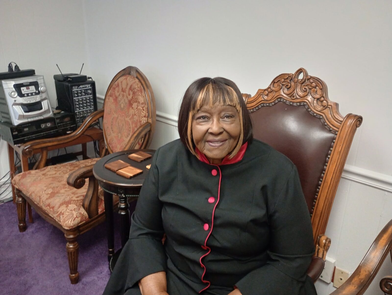 Pastor Carrie Mitchell-Long in ministerial attire
